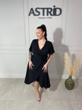 Rochie Anabela midi în cloș petrecută cu floare în talie