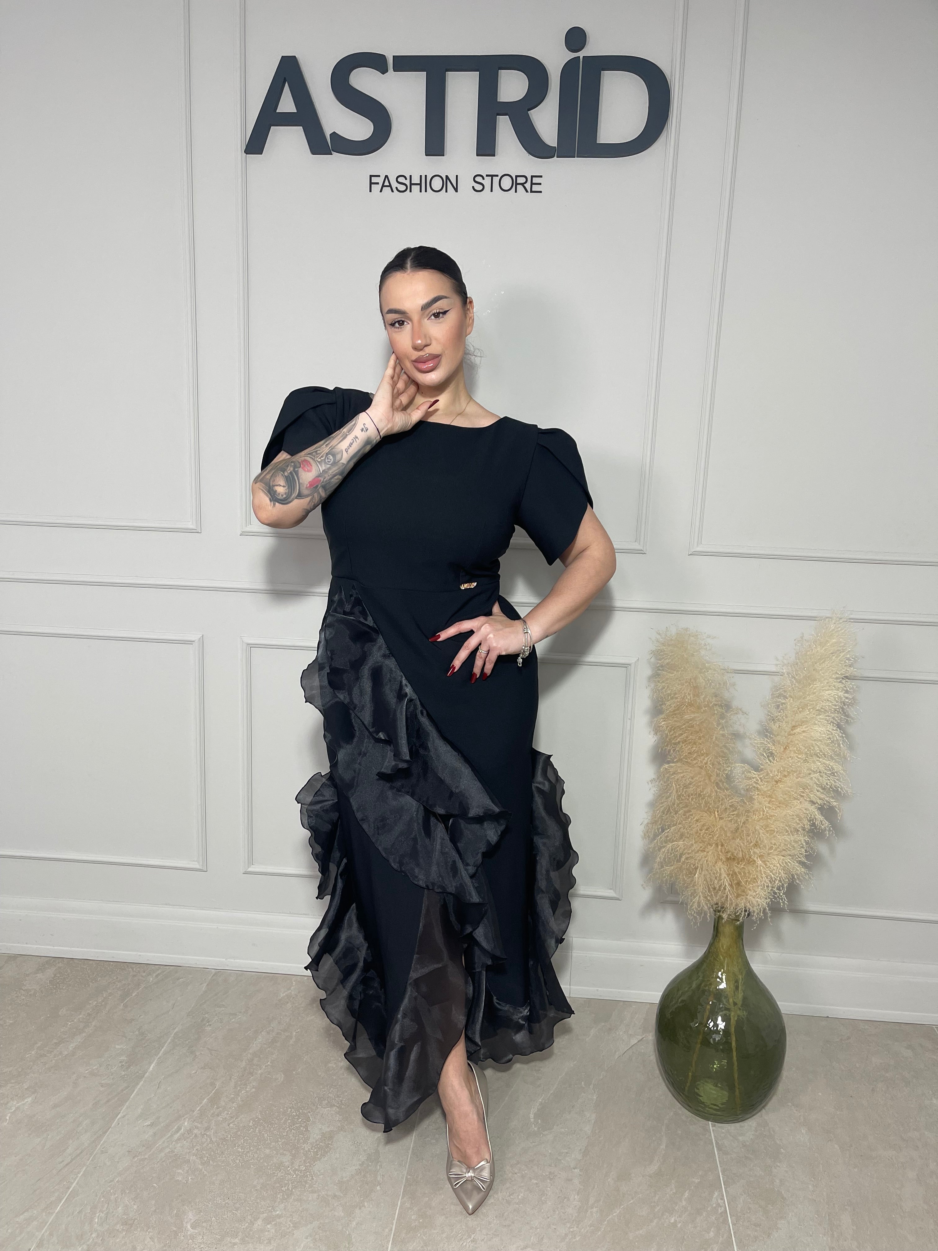 Rochie Donna neagră midi, cu croiala cambrata pe talie și ușor asimetrică