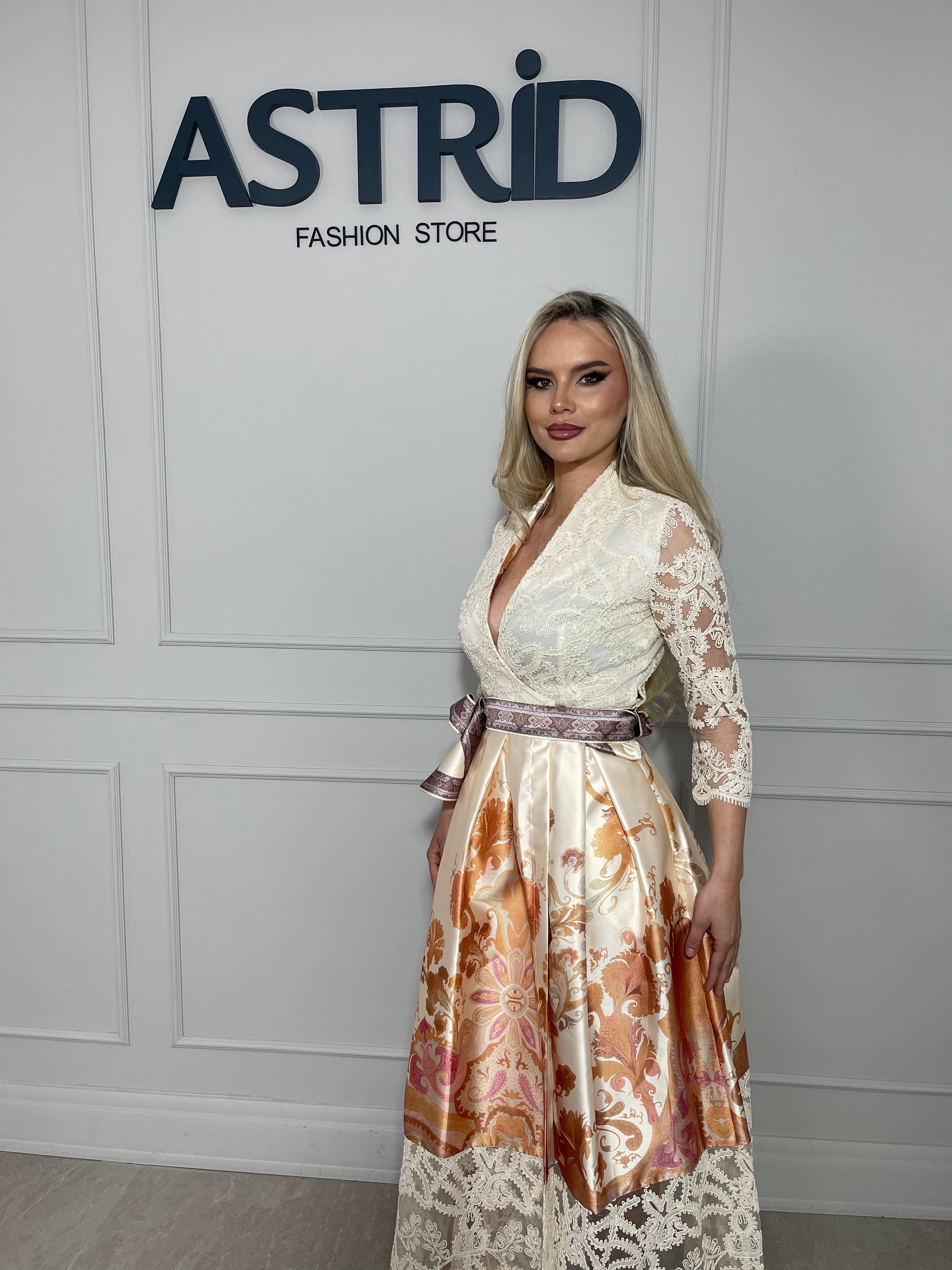 Rochie Mira midi elegantă, cu imprimeu tip dantelă și croiala feminină, ce evidențiază silueta.