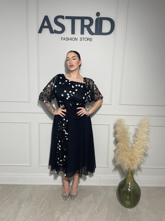 Rochie Sărita midi neagră, cu aplicații strălucitoare și design asimetric.