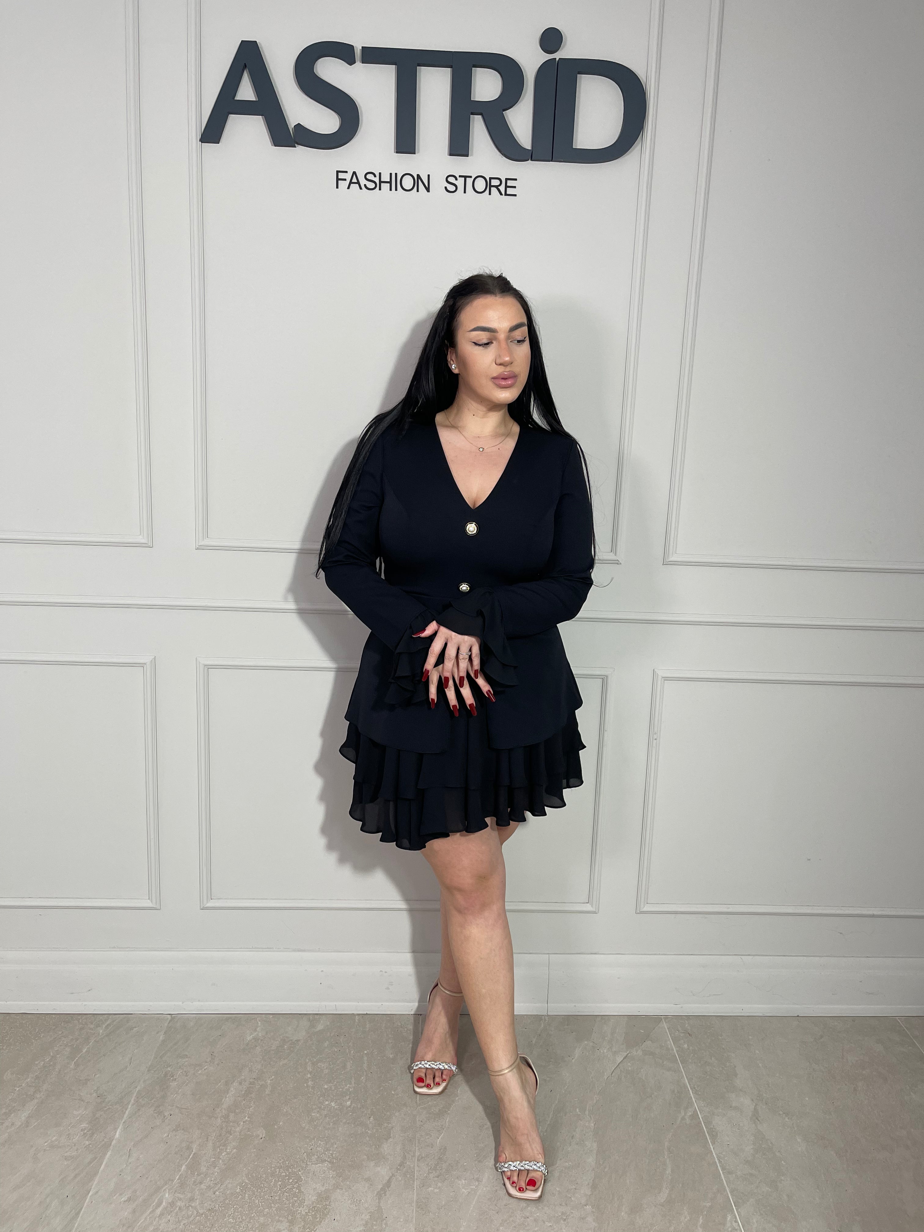 Rochie Emma scurtă, elegantă și versatila, cu mâneci lungi și decolteu în V.